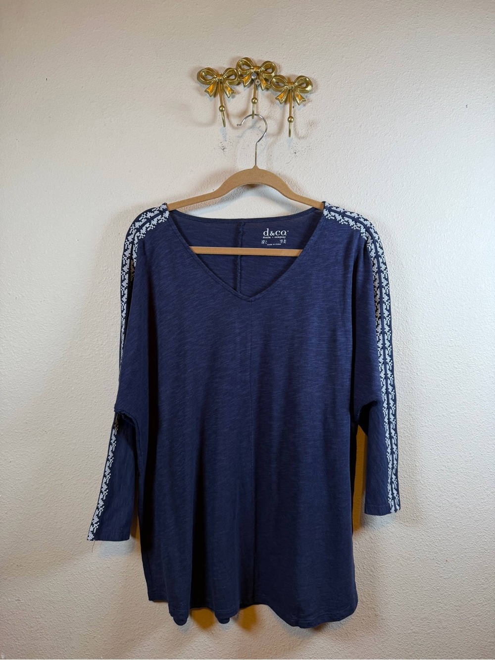 d&co Navy V-Neck Long Sleeve Top with White Embroidered Shoulder Trim.    Size L